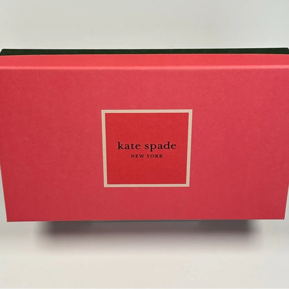 Kate Spade Pink box and green gift bag.